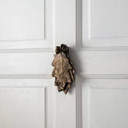 Elegant antique brass front door knocker with oak leaf design
